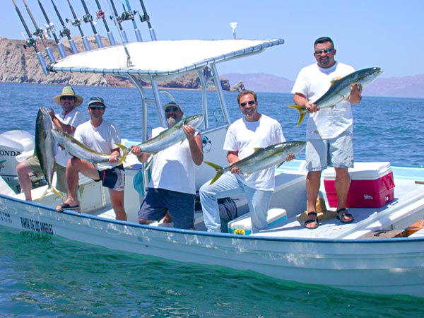 Bahia de los Angeles fishing guide Igor Galvan with yellowtail and sportfishing clients.