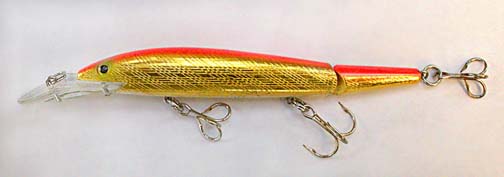 Photo of Jointed Rebel fishing lure with the tips of two hooks bent inward.